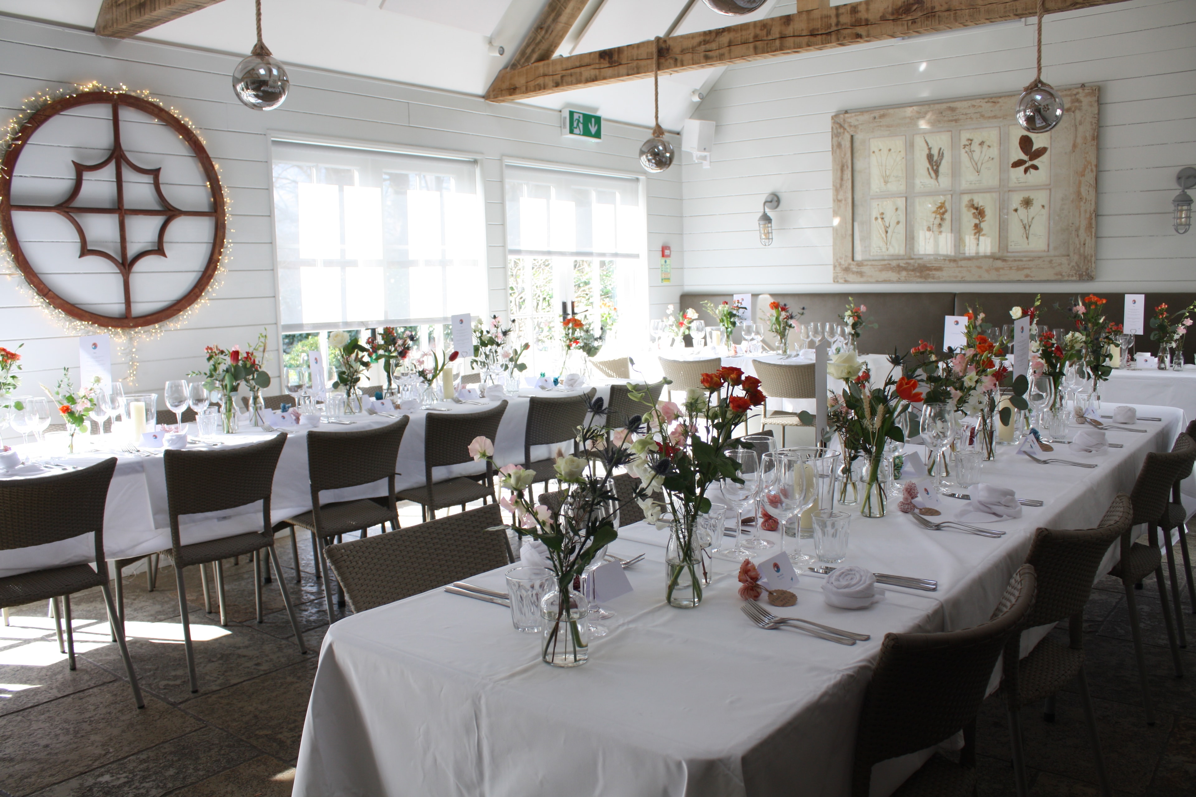 Wedding ceremony aisle with elegant floral arrangements