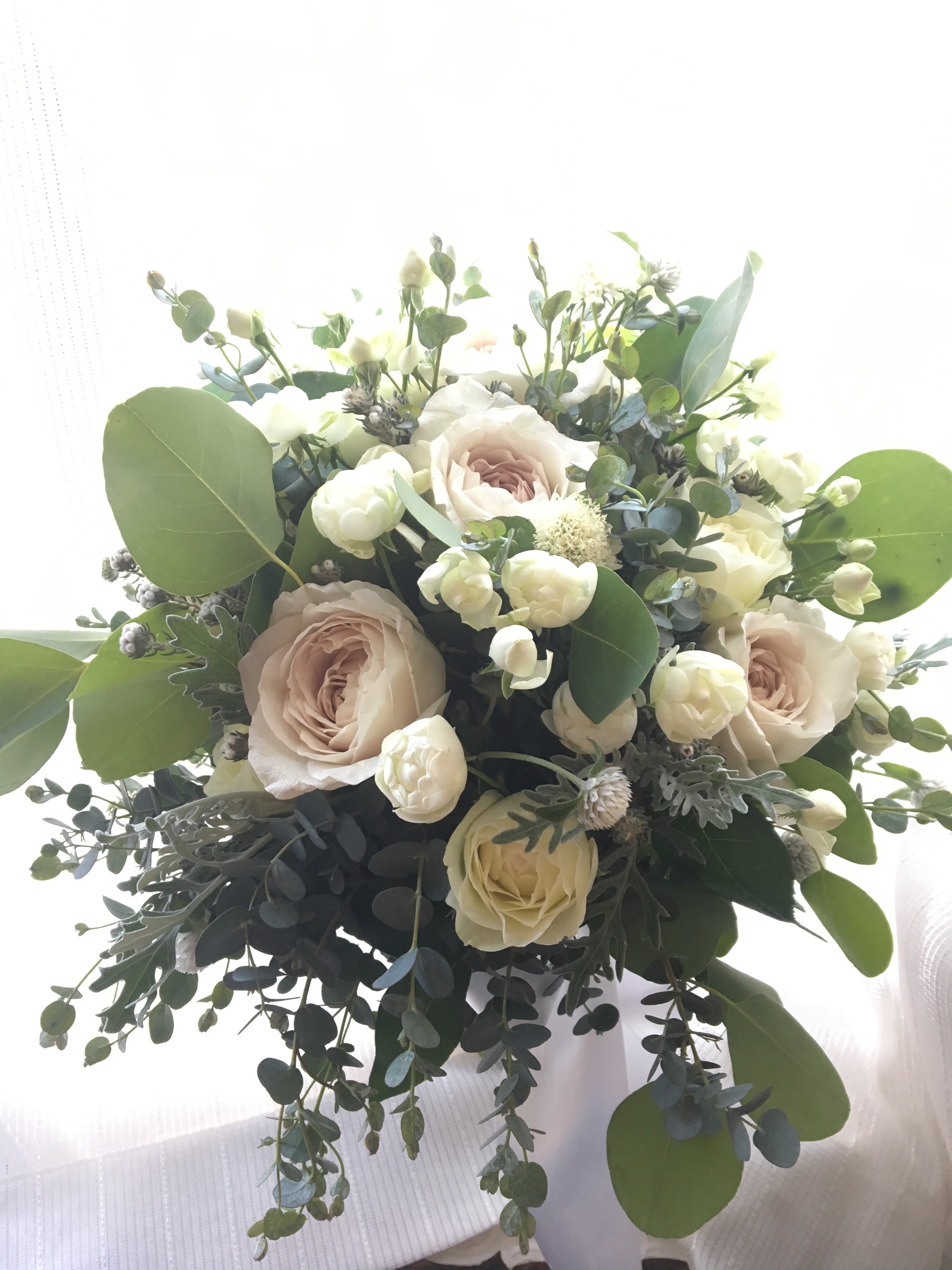 Elegant bridal bouquet by HANA Flower Works
