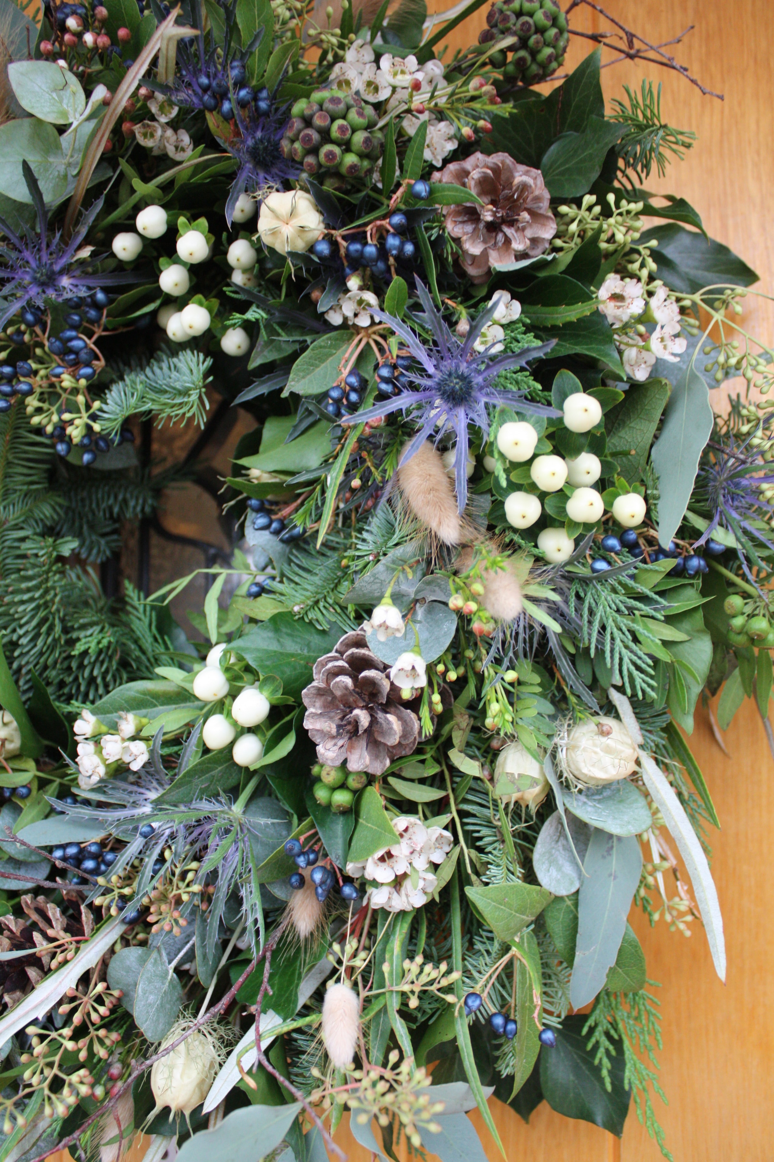 Winter wreath with eryngium and snowberries